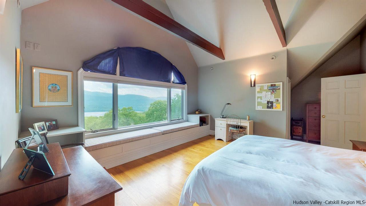 9 Torrens Hook Road, Unit DANCING ROCK Shokan, NY 12481 - Photo 14 of 23 a bed room with a bed and large window