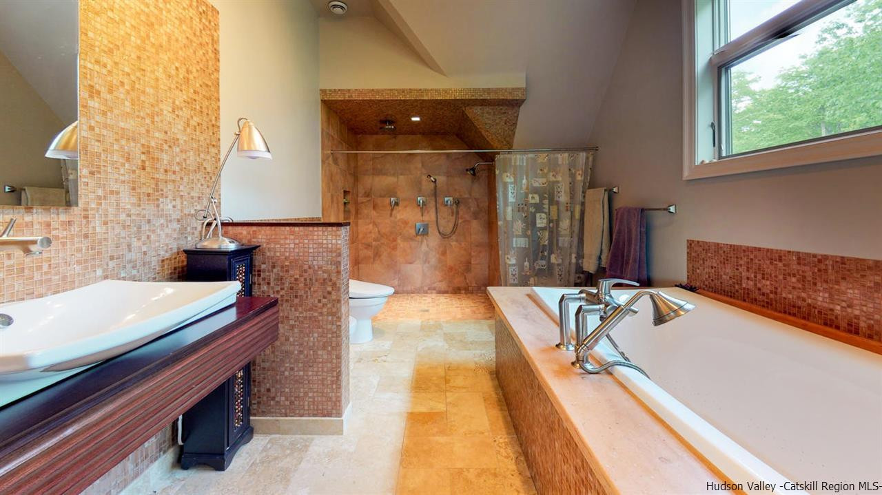 9 Torrens Hook Road, Unit DANCING ROCK Shokan, NY 12481 - Photo 15 of 23 a spacious bathroom with a tub and shower