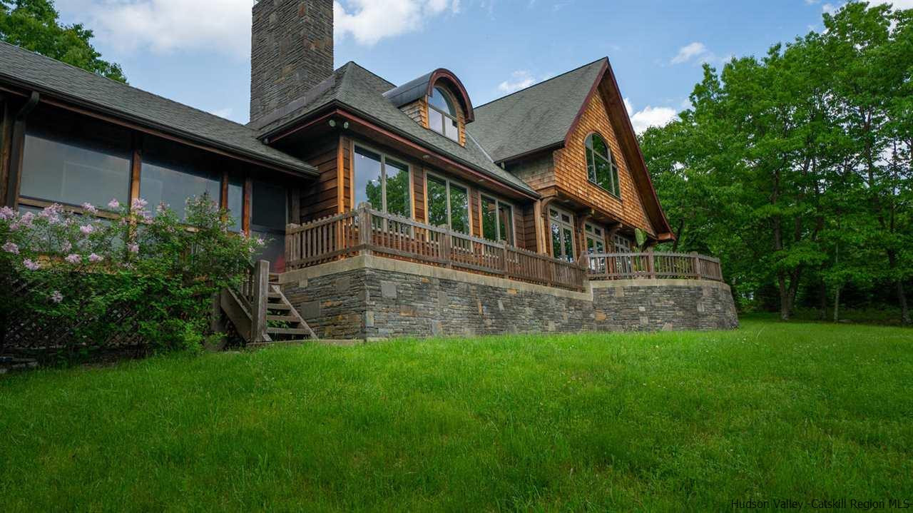 9 Torrens Hook Road, Unit DANCING ROCK Shokan, NY 12481 - Photo 20 of 23 a front view of house with yard and green space