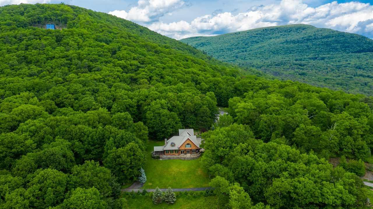 9 Torrens Hook Road, Unit DANCING ROCK Shokan, NY 12481 - Photo 2 of 23 a aerial view of a house with a yard