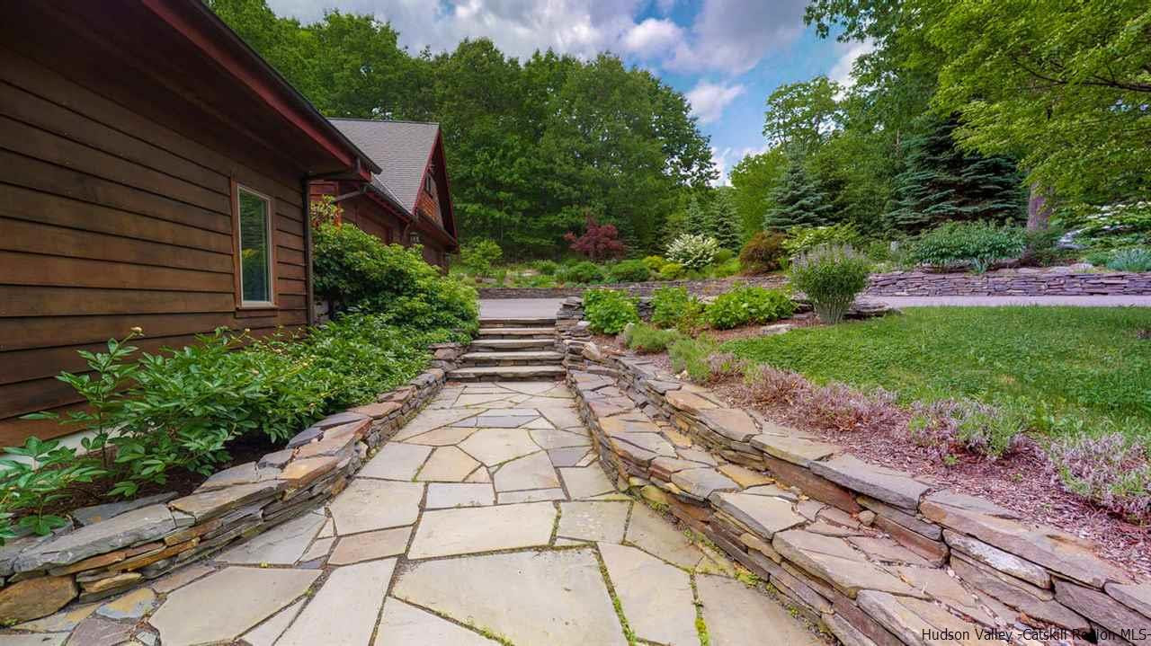 9 Torrens Hook Road, Unit DANCING ROCK Shokan, NY 12481 - Photo 4 of 23 a view of a pathway with a houses