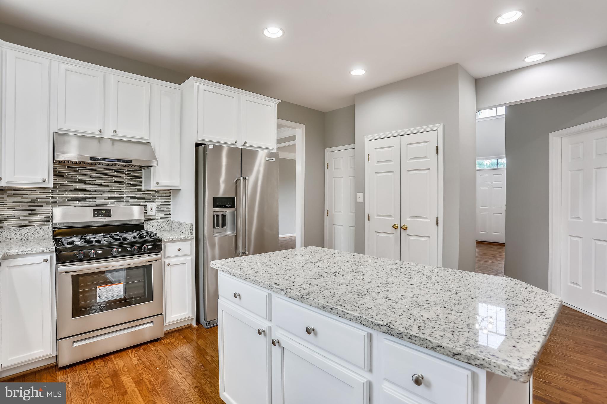 13929 Falconcrest Road Germantown, MD 20874 - Photo 12 of 76 Granite, back splash, SS appliances, center island