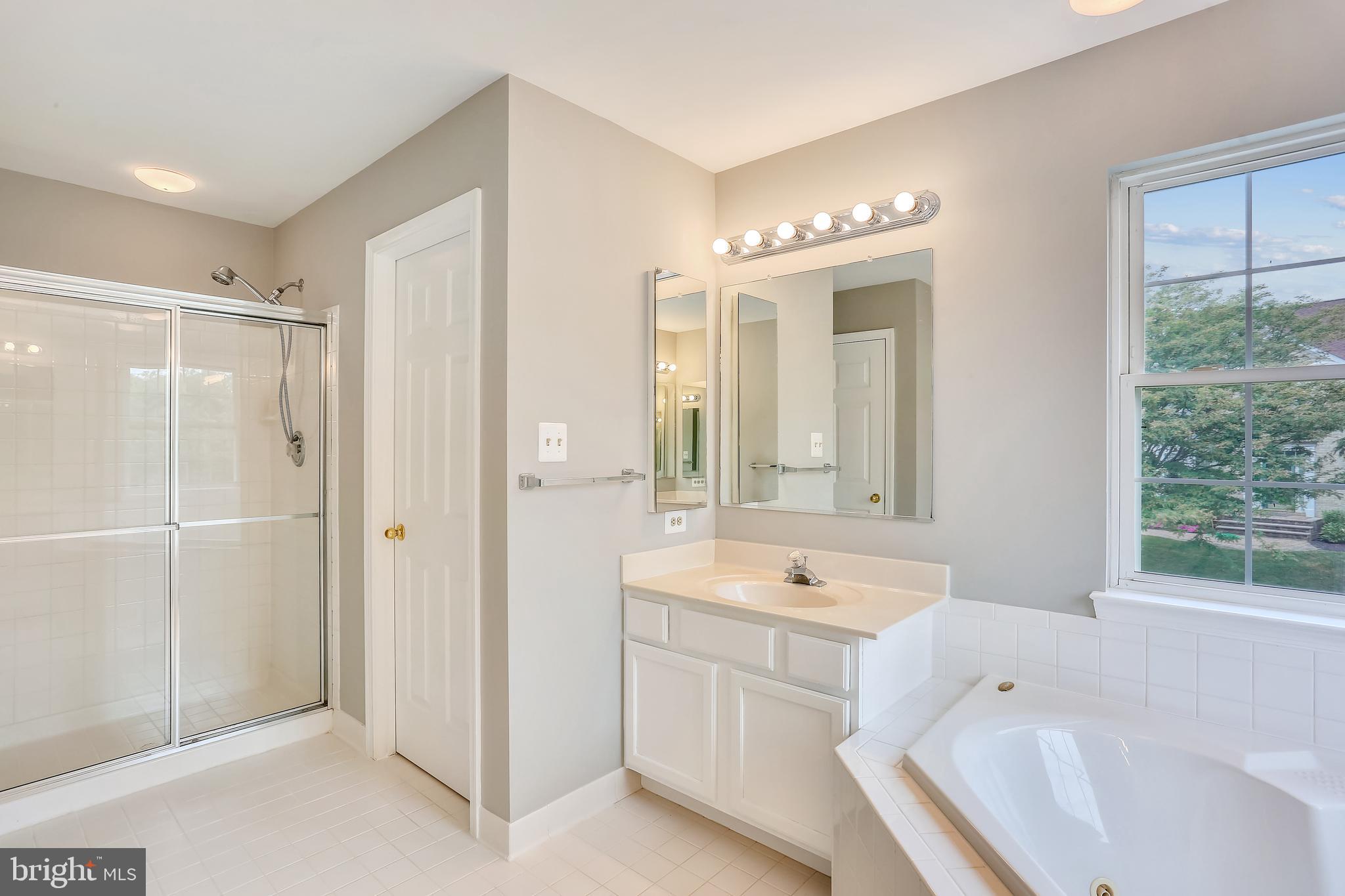 13929 Falconcrest Road Germantown, MD 20874 - Photo 31 of 76 Master bath with soaking tub and separate shower