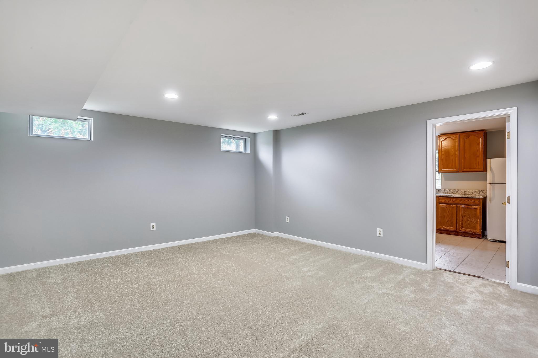 13929 Falconcrest Road Germantown, MD 20874 - Photo 46 of 76 Rec room adjoins kitchenette
