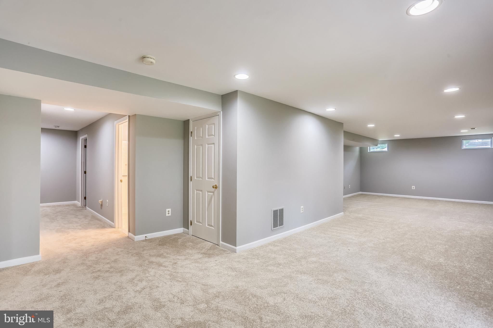 13929 Falconcrest Road Germantown, MD 20874 - Photo 56 of 76 Lower level rec room