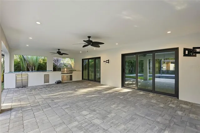 a view of a livingroom with a staircase and a fireplace