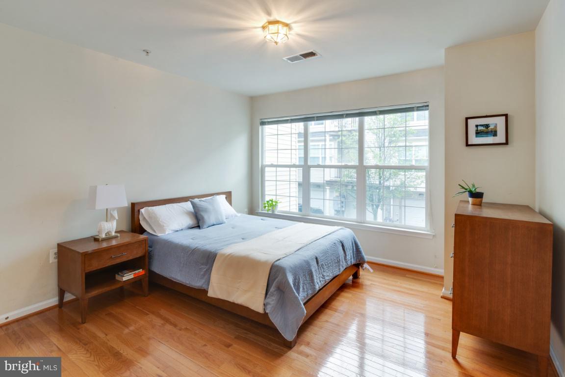 11326 King George Drive, Unit 7 Silver Spring, MD 20902 - Photo 17 of 34 Master bedroom with hard wood floors