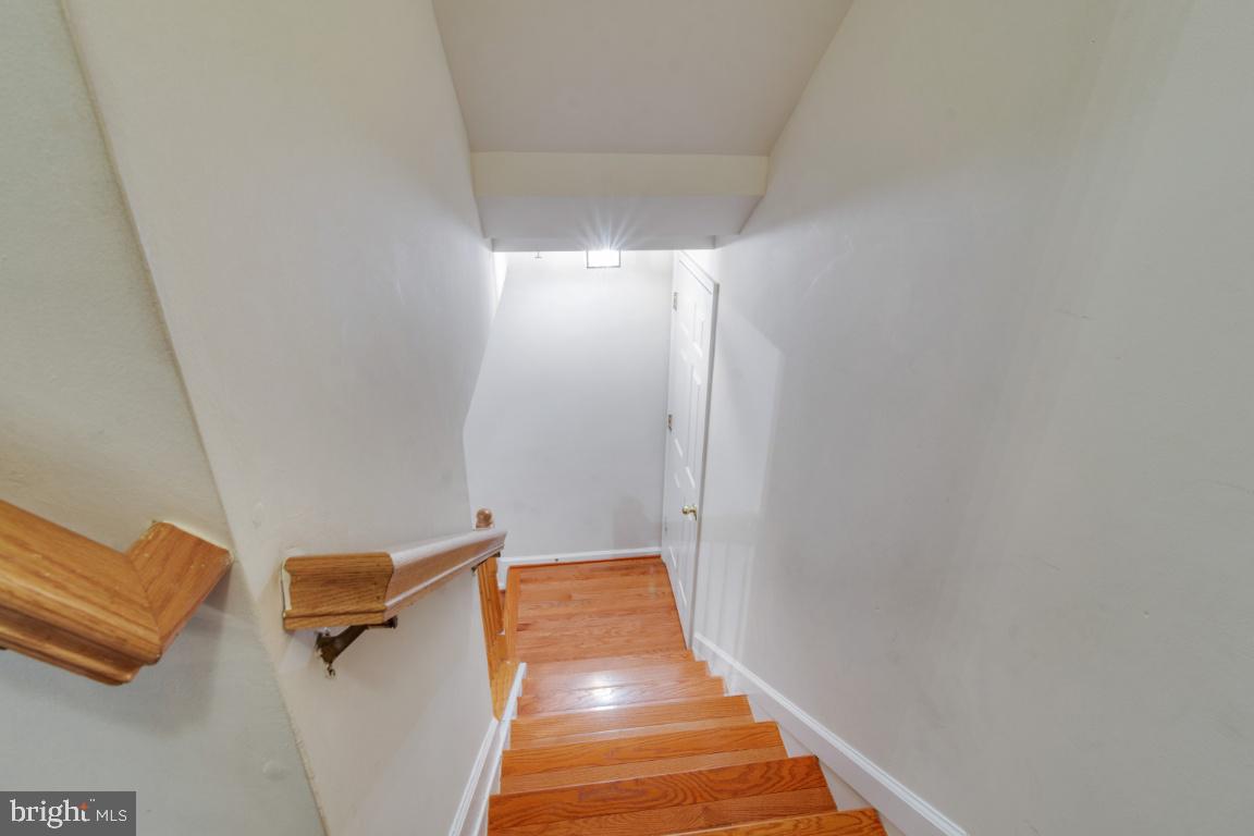 11326 King George Drive, Unit 7 Silver Spring, MD 20902 - Photo 23 of 34 Hardwood on stairs
