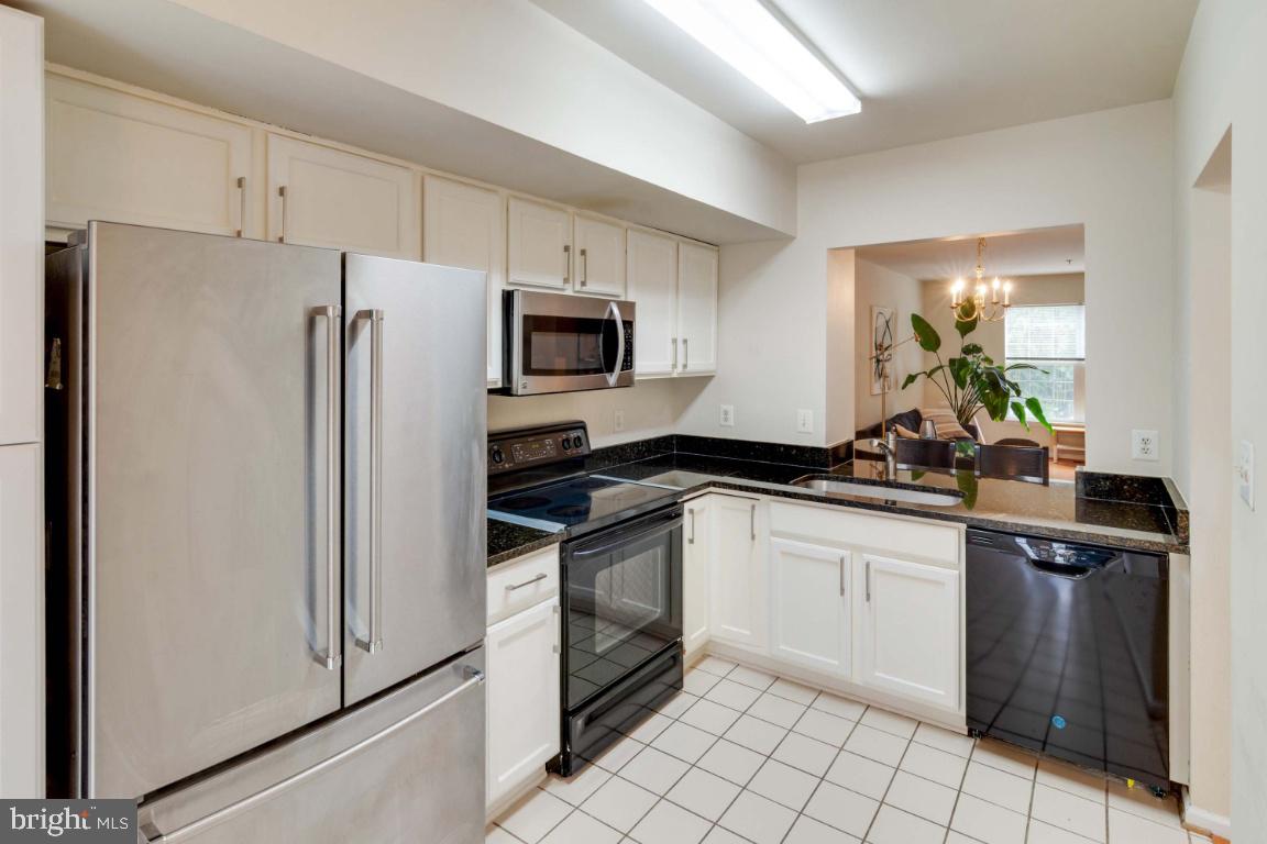 11326 King George Drive, Unit 7 Silver Spring, MD 20902 - Photo 7 of 34 Large kitchen opens to living area