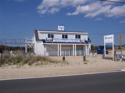 38 Weaver Road Centerville, MA 02632 - Photo 13 of 18 a front view of a house with a yard