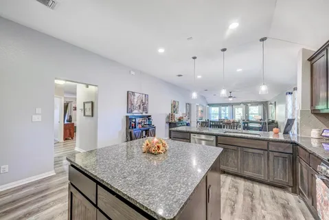 a view of a living room with a bed