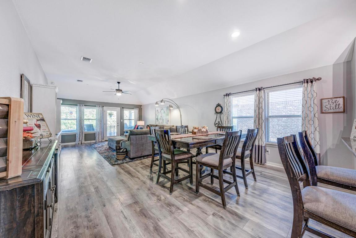 3101 Diego Cove Round Rock, TX 78665 - Photo 14 of 40 a view of a dining room with furniture window and wooden floor