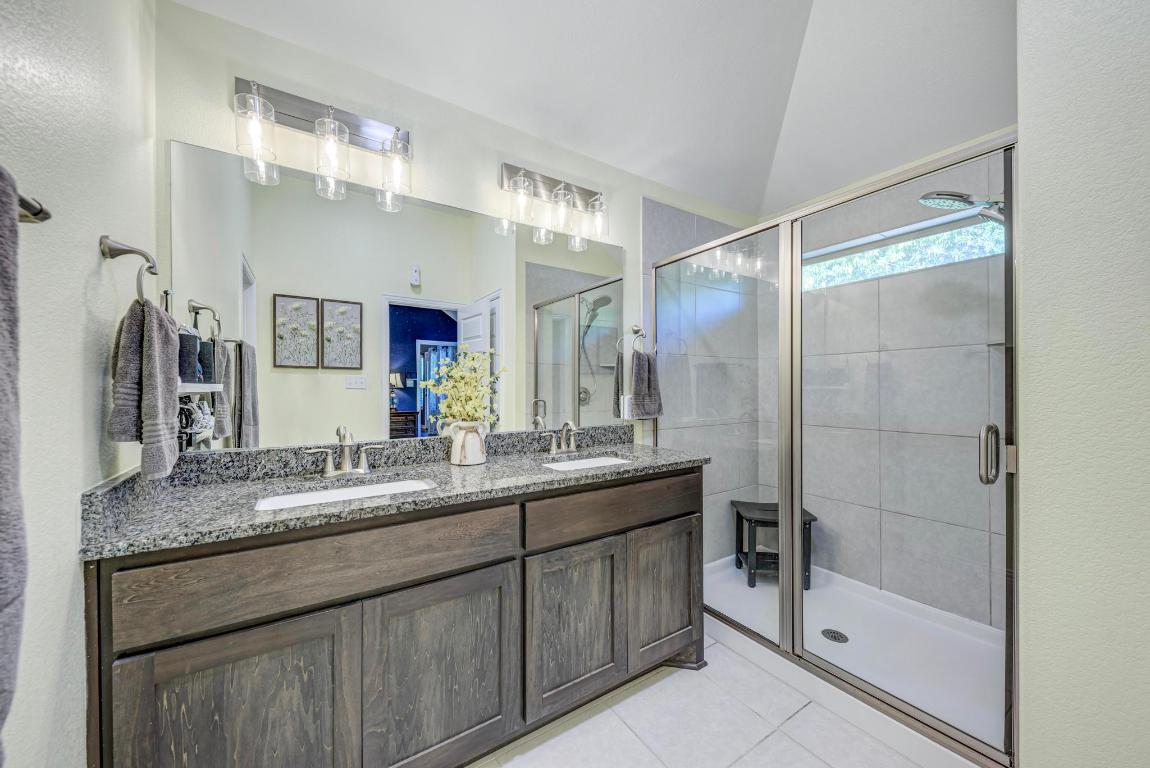 3101 Diego Cove Round Rock, TX 78665 - Photo 20 of 40 a bathroom with a granite countertop sink mirror and double