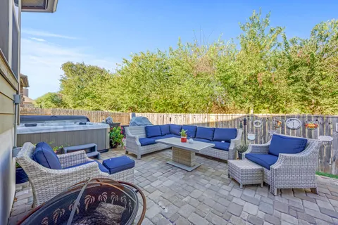 a kitchen with a refrigerator and a stove