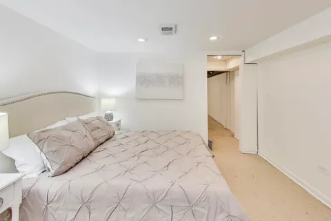 a bathroom with a sink toilet tub and shower