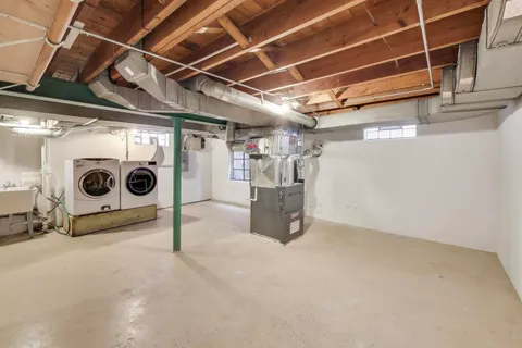 a view of an empty room with stairs