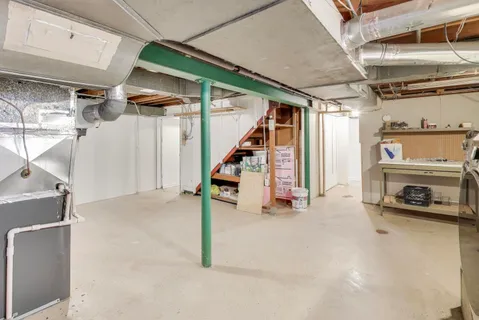 a front view of a house with a garage