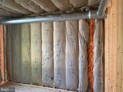 a bathroom with a shower and a tub