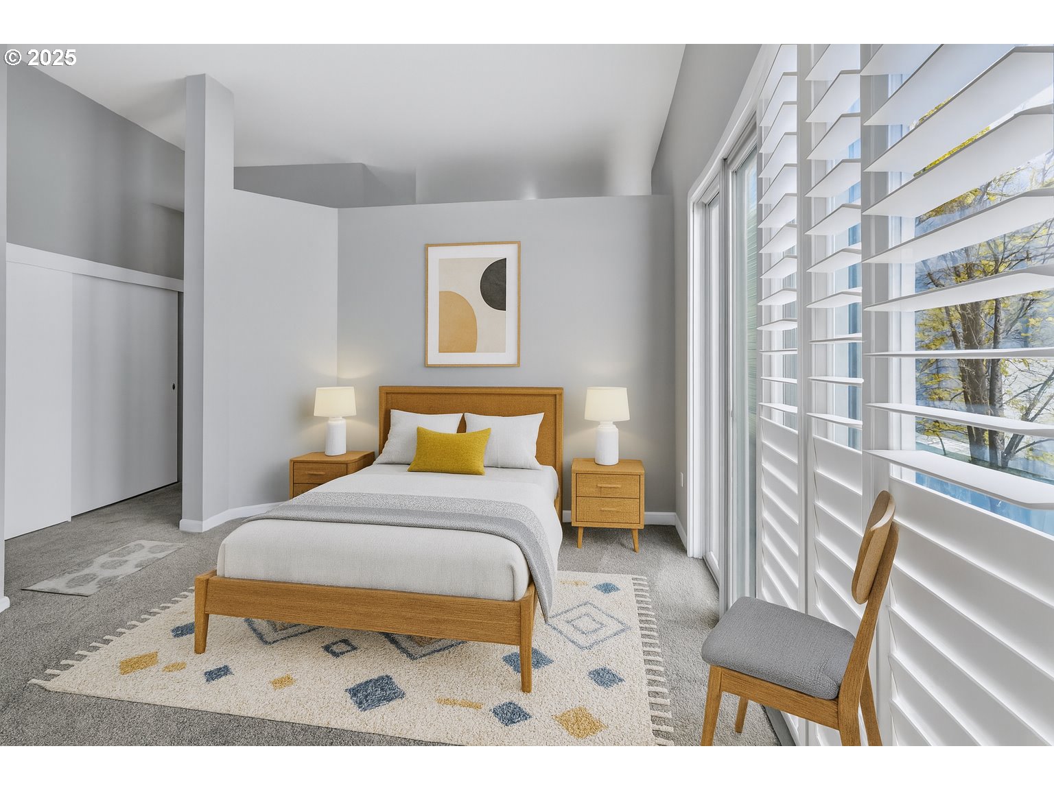 12600 Southwest Crescent Street, Unit 420 Beaverton, OR 97005 - Photo 22 of 45 a bedroom with a bed and wooden floor