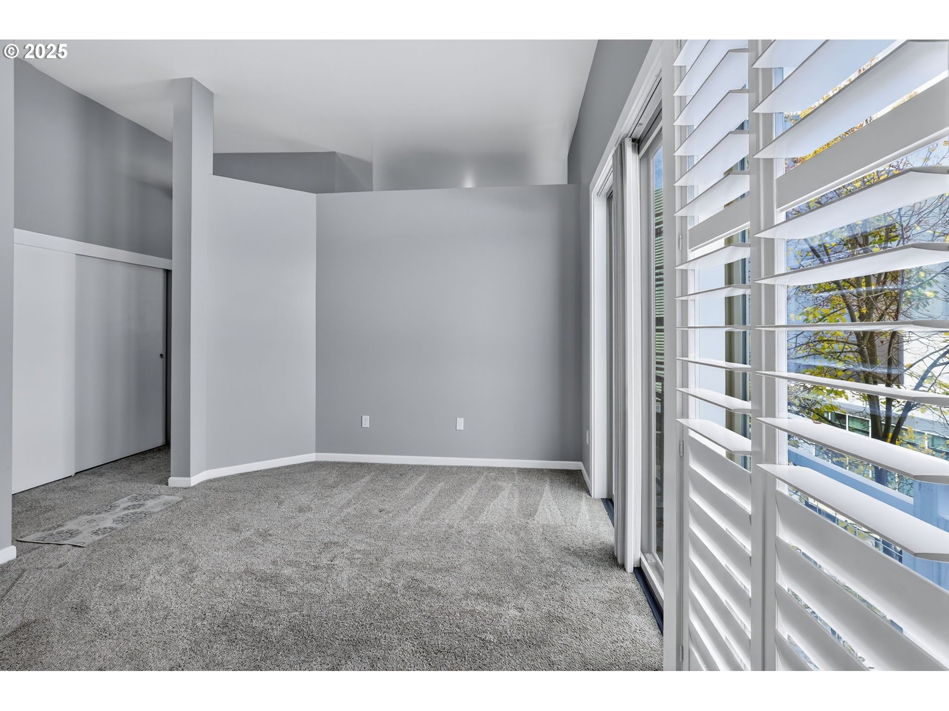 12600 Southwest Crescent Street, Unit 420 Beaverton, OR 97005 - Photo 23 of 45 a view of an empty room with a window