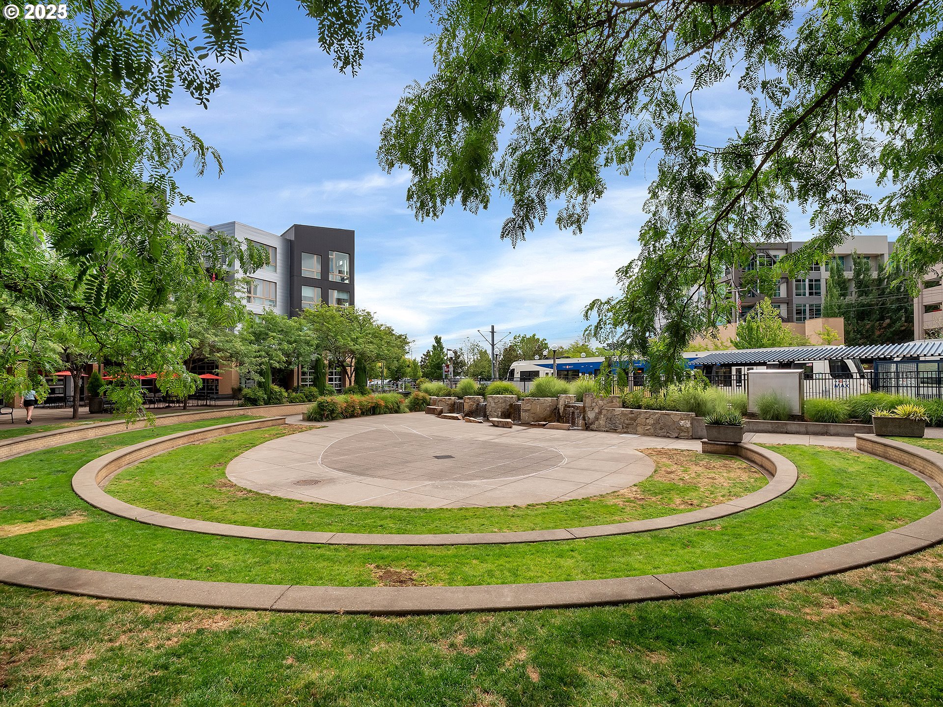 12600 Southwest Crescent Street, Unit 420 Beaverton, OR 97005 - Photo 3 of 45 a view of a fountain in front of a house