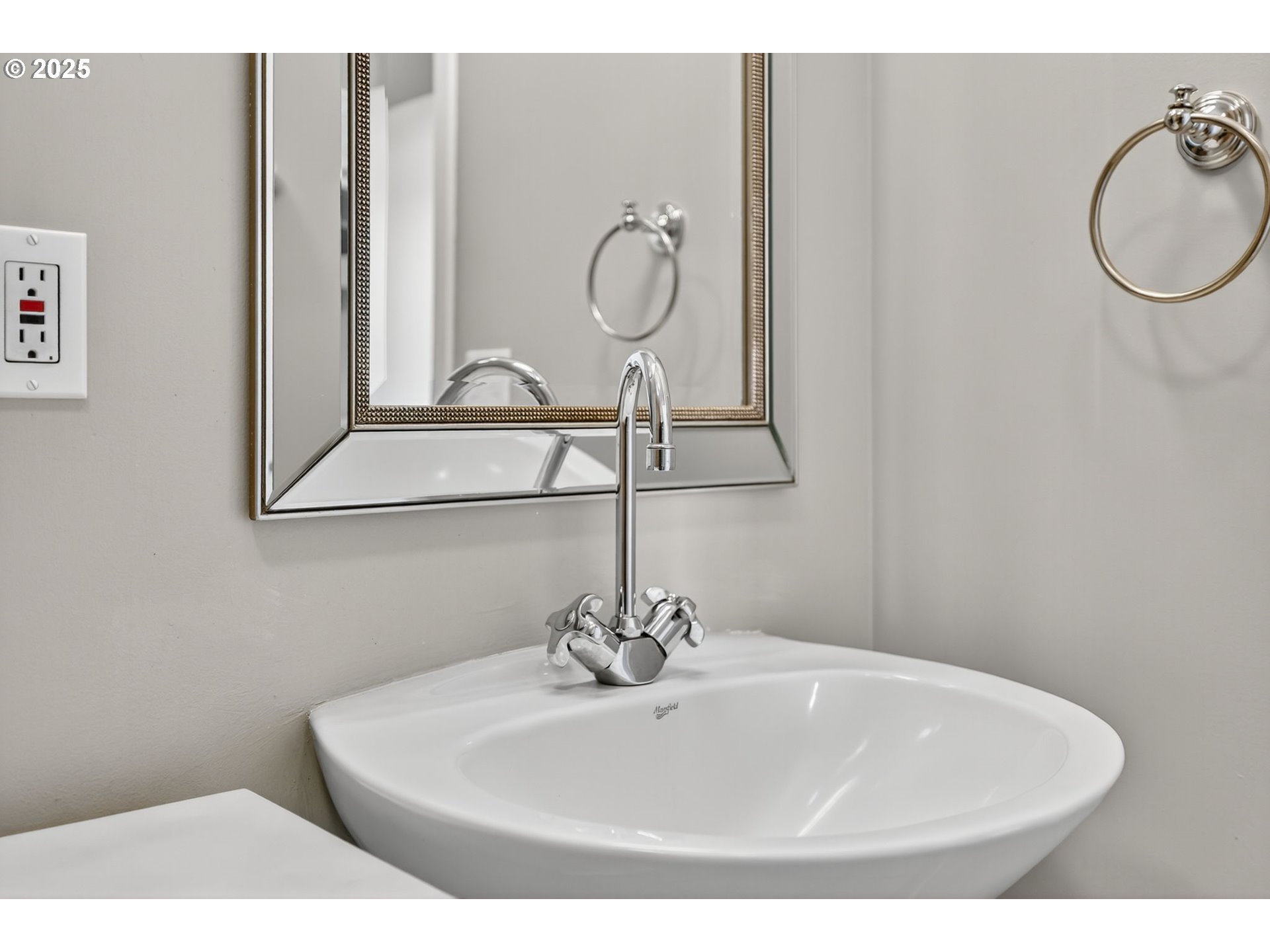 12600 Southwest Crescent Street, Unit 420 Beaverton, OR 97005 - Photo 32 of 45 a bathroom with a sink and a mirror