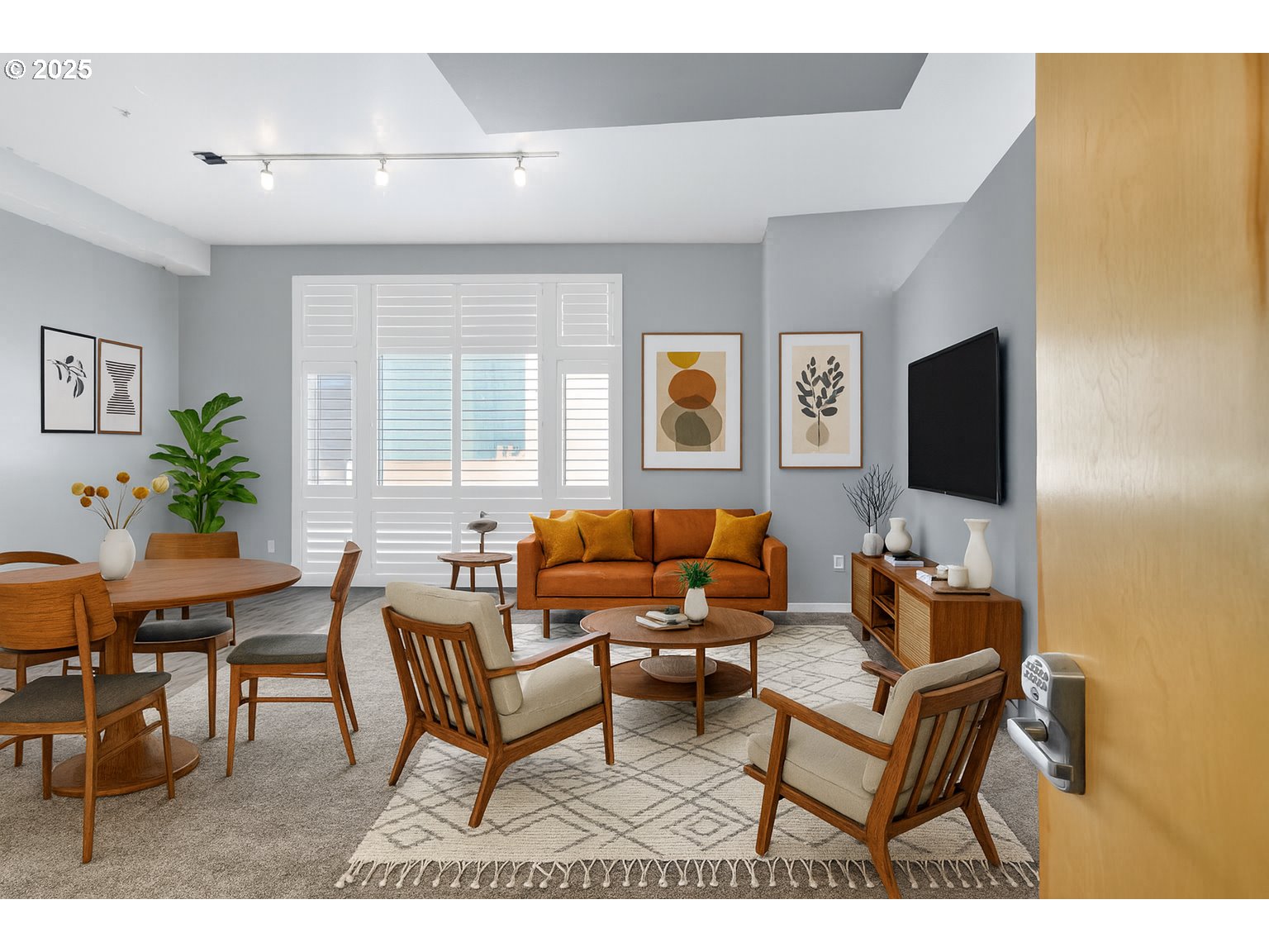 12600 Southwest Crescent Street, Unit 420 Beaverton, OR 97005 - Photo 8 of 45 a living room with furniture and a flat screen tv