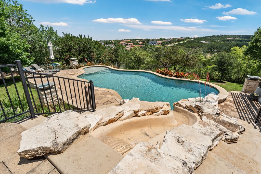 203 Lodestone Lane Austin, TX 78738 - Photo 4 of 40 Slide into the pool