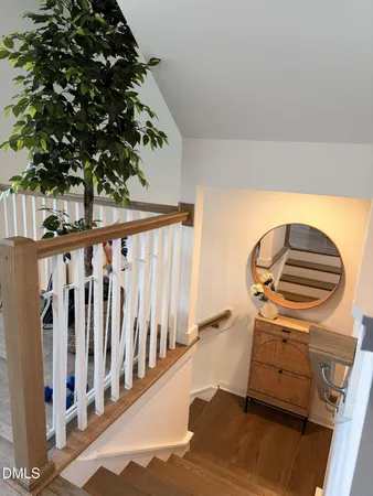 a view of a livingroom with wooden floor