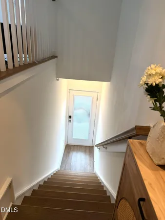 a view of entryway with wooden floor