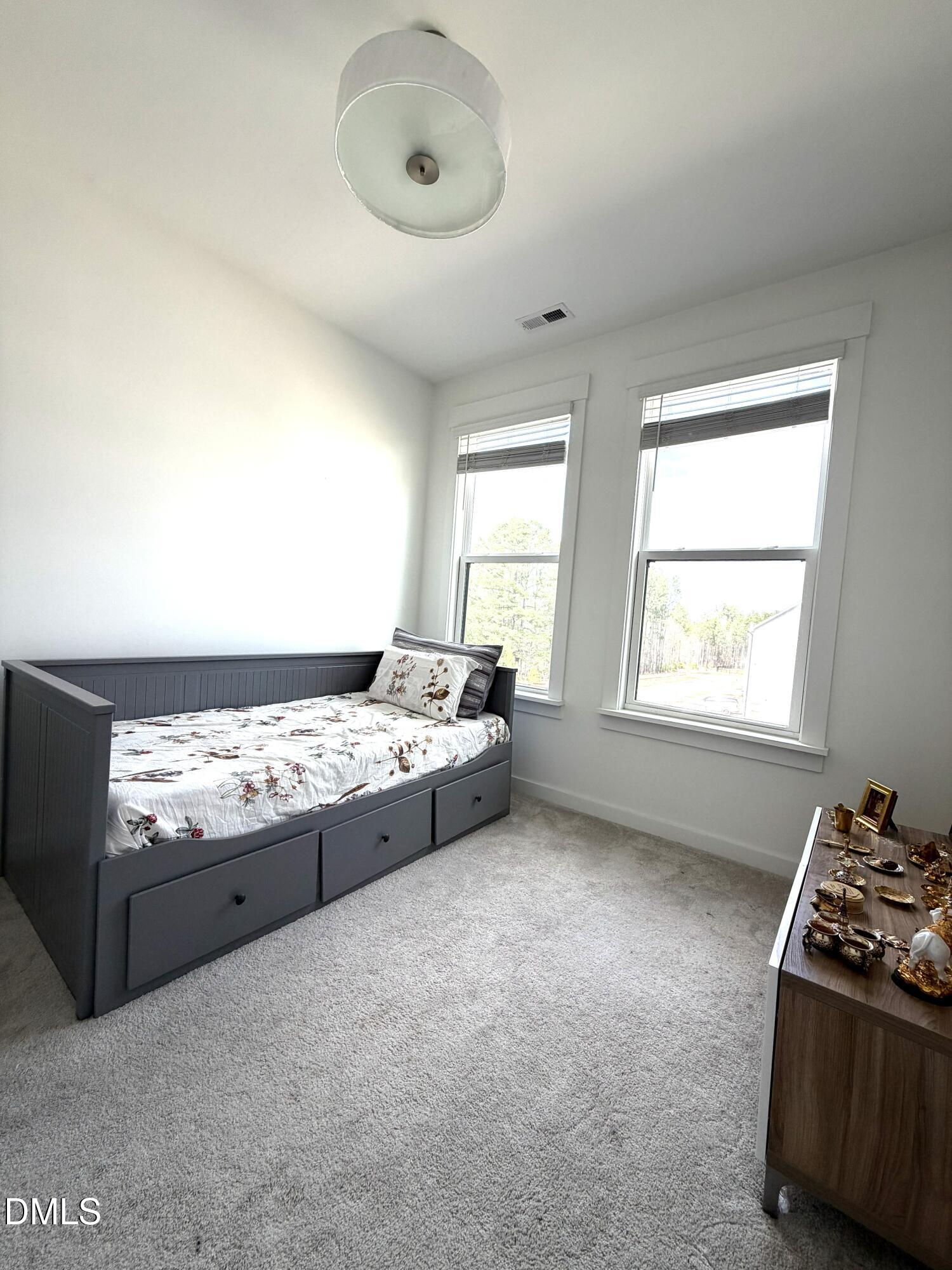 1250 Corkery Ridge Court Cary, NC 27519 - Photo 26 of 31 a kitchen with granite countertop a stove and a refrigerator