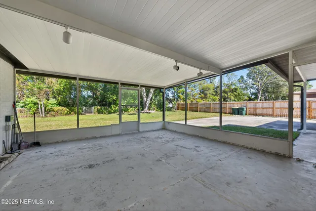 a view of a garden with an outdoor space