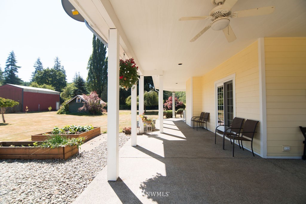 142 Leudinghaus Road Chehalis, WA 98532 - Photo 4 of 37 a view of a patio with couches chairs and potted plants