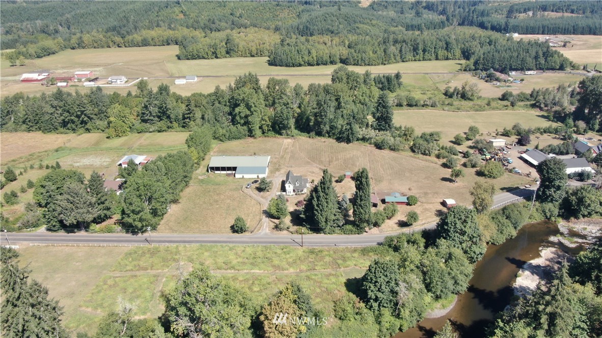 142 Leudinghaus Road Chehalis, WA 98532 - Photo 36 of 37 an aerial view of a house with a yard and lake view