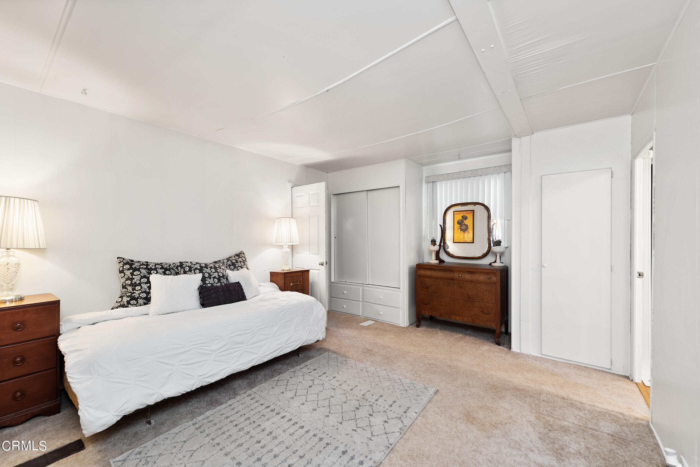 0 Chaucer Moorpark, CA 93021 - Photo 21 of 45 a bedroom with furniture and a window