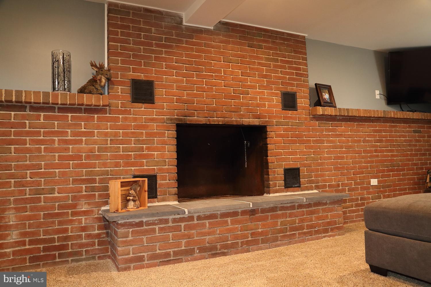 1353 Horning Road Denver, PA 17517 - Photo 19 of 20 Brick fire place in lower level