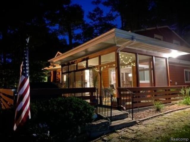 2106 Tecumseh River Road Lansing, MI 48906 - Photo 27 of 33 28-Screened POrch.jpg