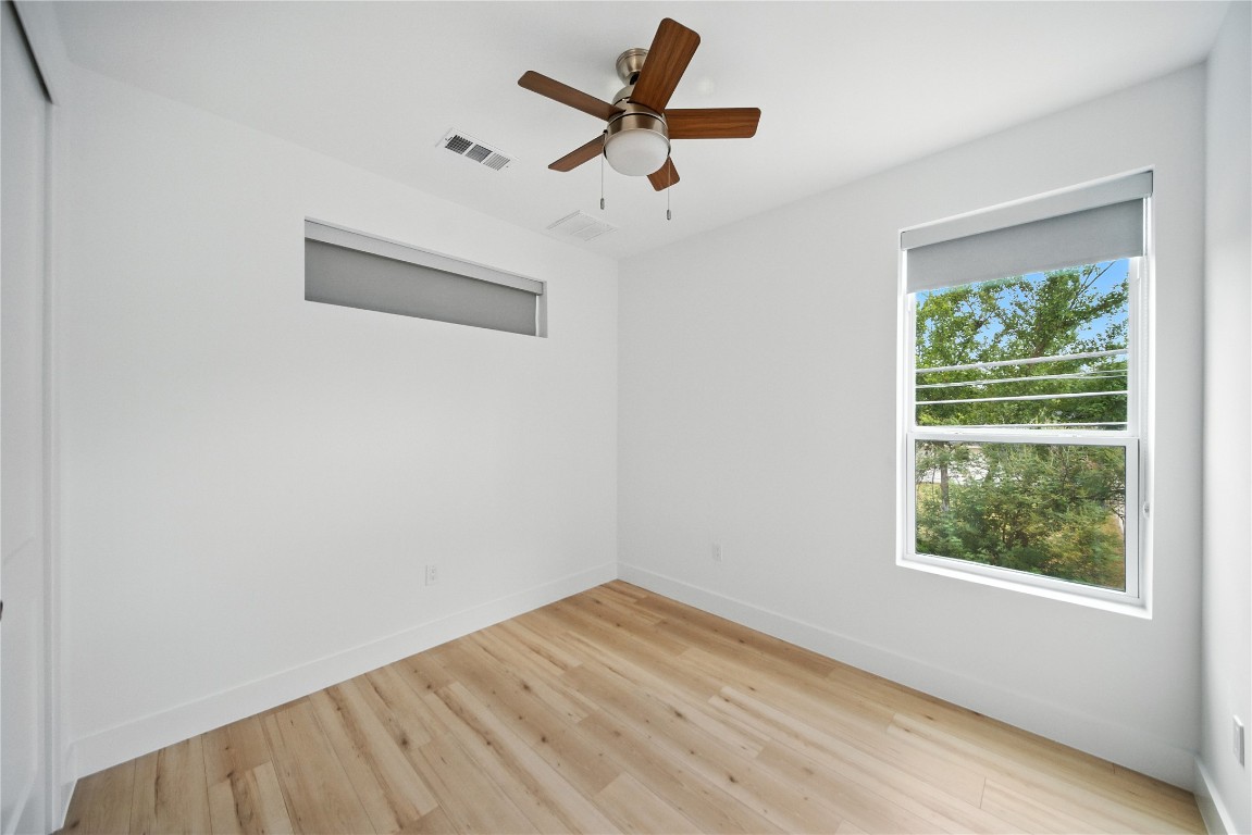 106 West Croslin Street, Unit B Austin, TX 78752 - Photo 15 of 23 an empty room with a window