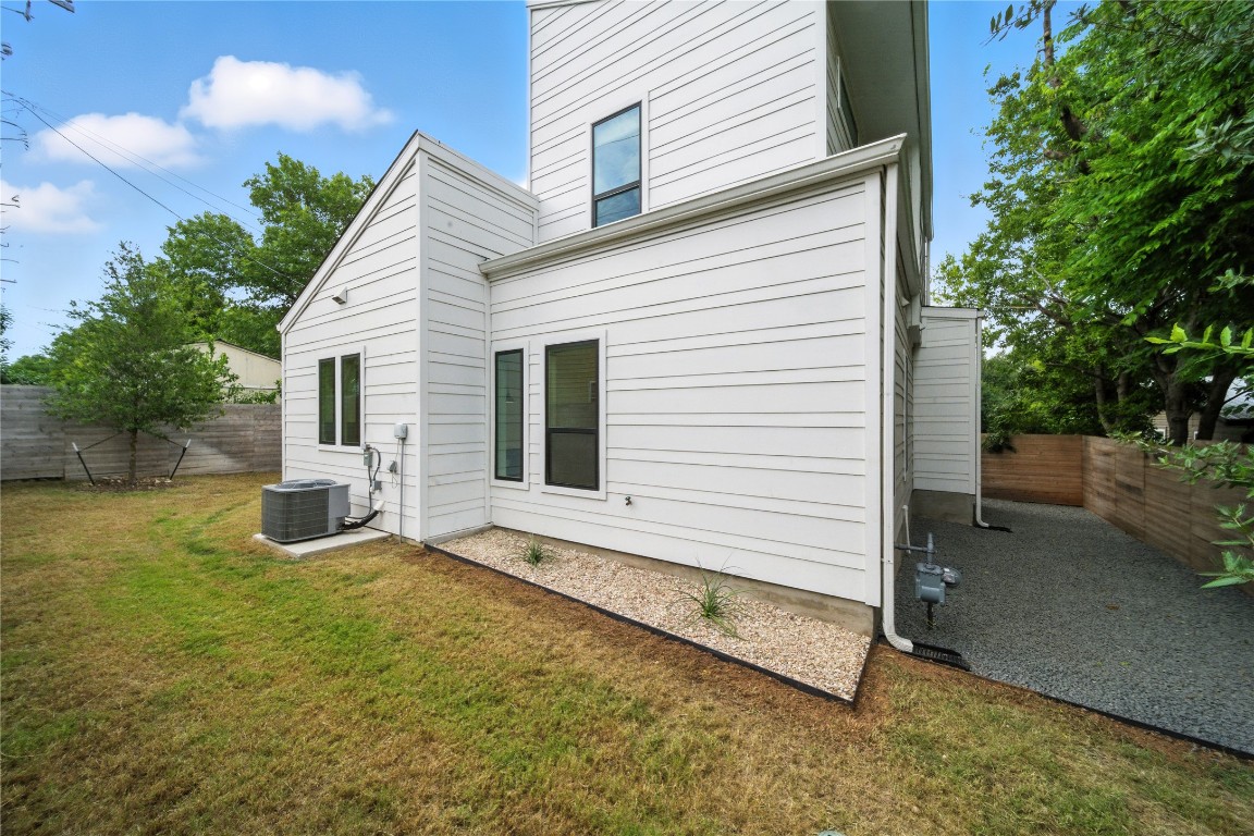 106 West Croslin Street, Unit B Austin, TX 78752 - Photo 20 of 23 a view of a house with backyard and sitting area