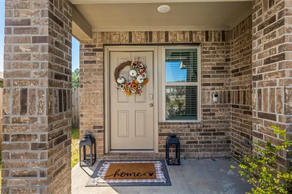 a front view of a house with a door