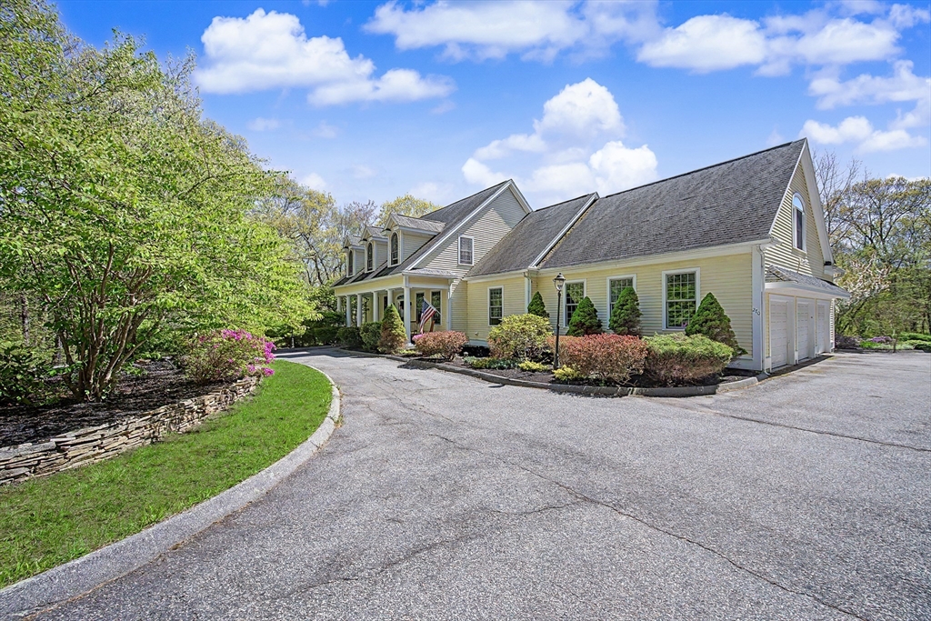 270 Mendon Road Sutton, MA 01590 - Photo 2 of 42 a view of a house with entertaining space and a large tree
