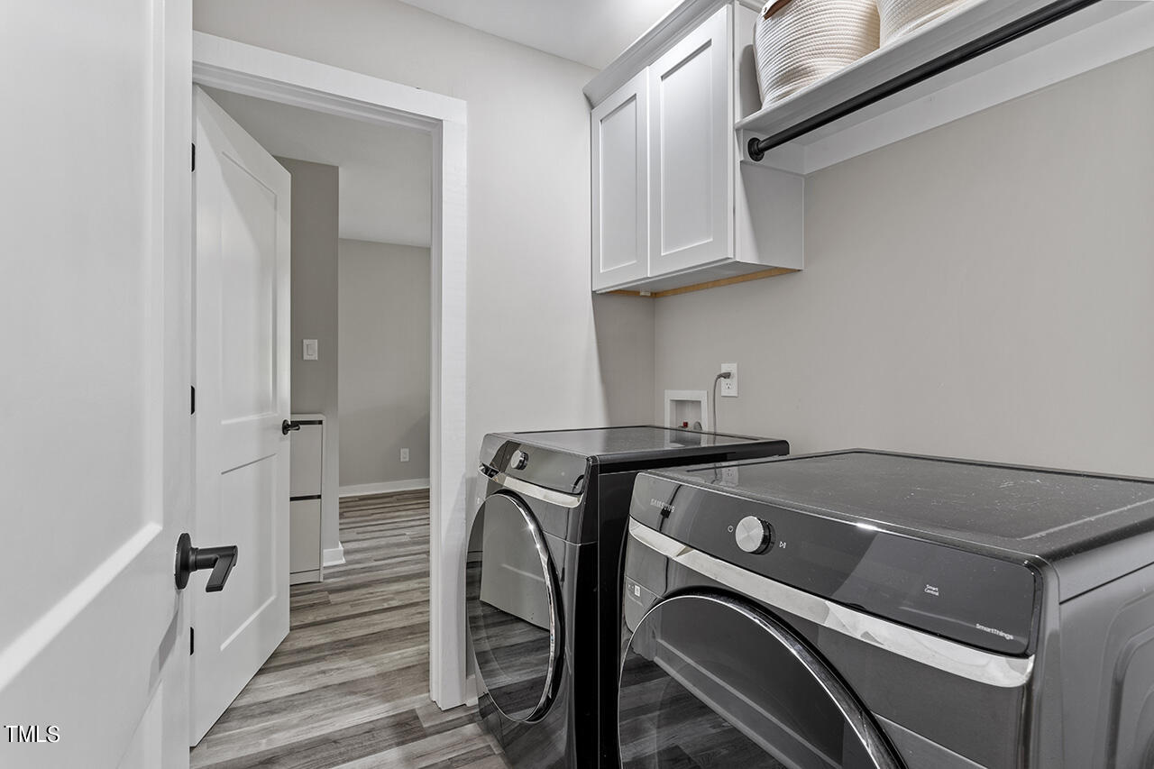 2241 Sheffield Road Raleigh, NC 27610 - Photo 26 of 33 a utility room with dryer and washer