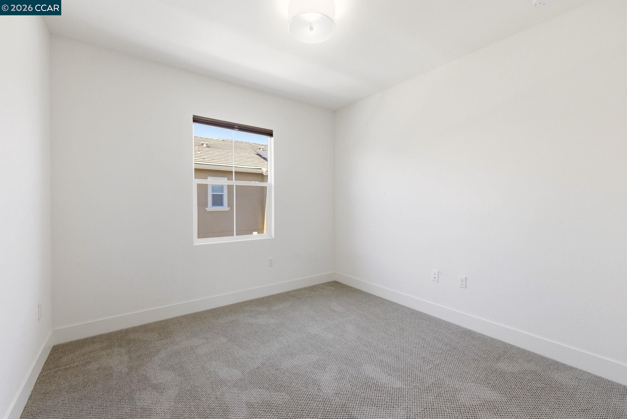 205 Plum Tree Street Livermore, CA 94551 - Photo 38 of 47 a view of an empty room with a window