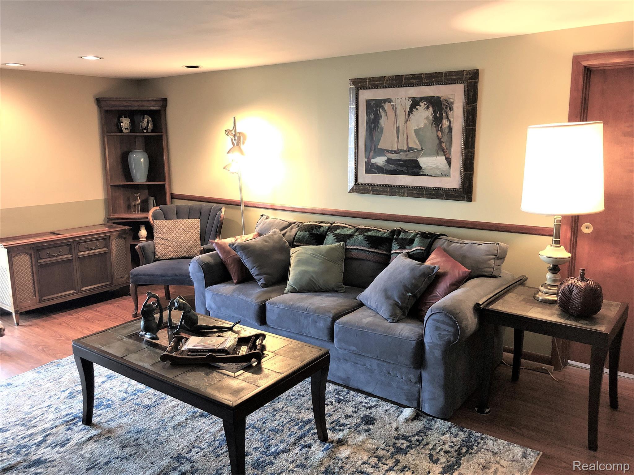1177 Butler Boulevard Howell, MI 48843 - Photo 30 of 40 LL Living Room with walk-out access waterfront