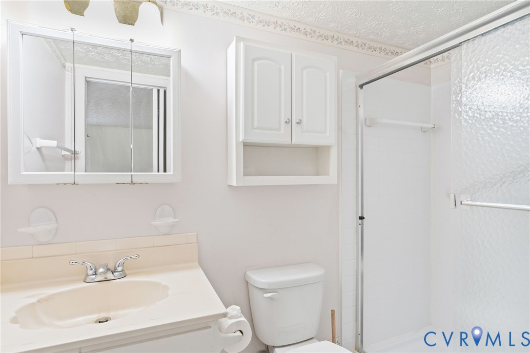 1501 Regency Woods Road, Unit 101 Henrico, VA 23238 - Photo 12 of 29 The primary bedroom features a walk-in closet and