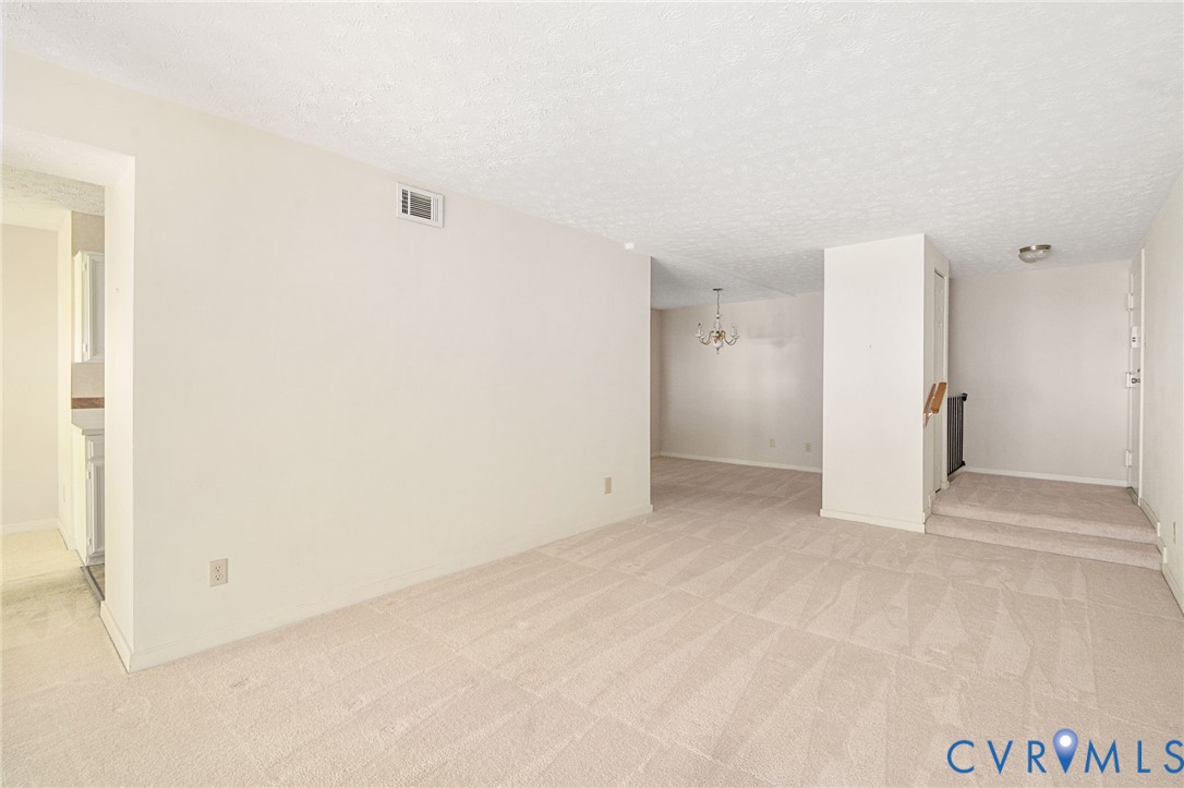 1501 Regency Woods Road, Unit 101 Henrico, VA 23238 - Photo 3 of 29 The spacious family room features a large sliding