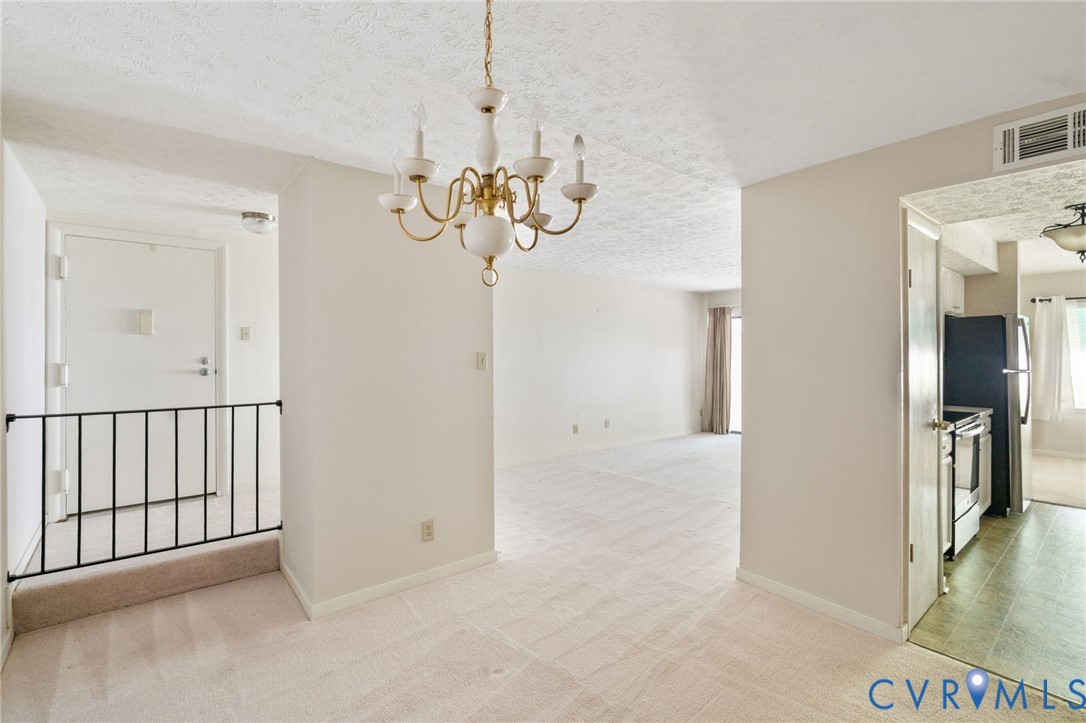 1501 Regency Woods Road, Unit 101 Henrico, VA 23238 - Photo 7 of 29 Adjoining the family room is the generously sized