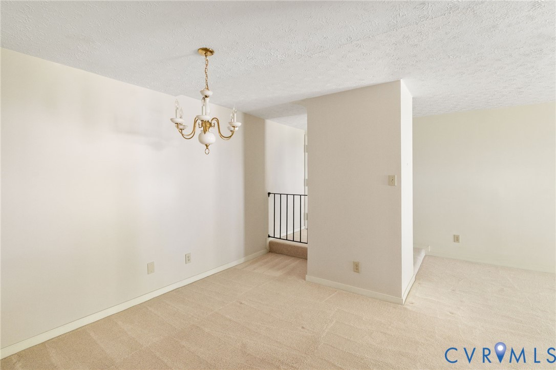 1501 Regency Woods Road, Unit 101 Henrico, VA 23238 - Photo 8 of 29 Adjoining the family room is the generously sized