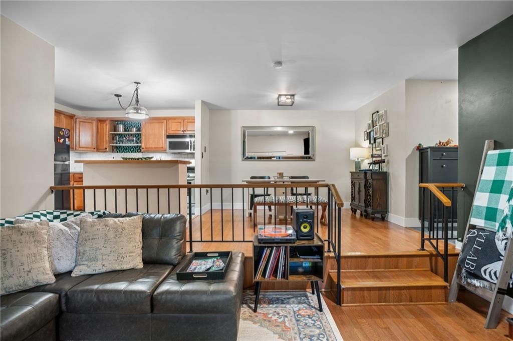 1706 Kenzie Road Pittsburgh, PA 15205 - Photo 4 of 25 a living room with furniture and wooden floor