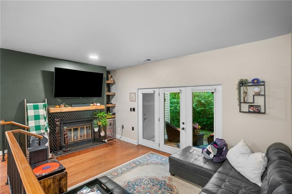 1706 Kenzie Road Pittsburgh, PA 15205 - Photo 6 of 25 a living room with furniture and a flat screen tv